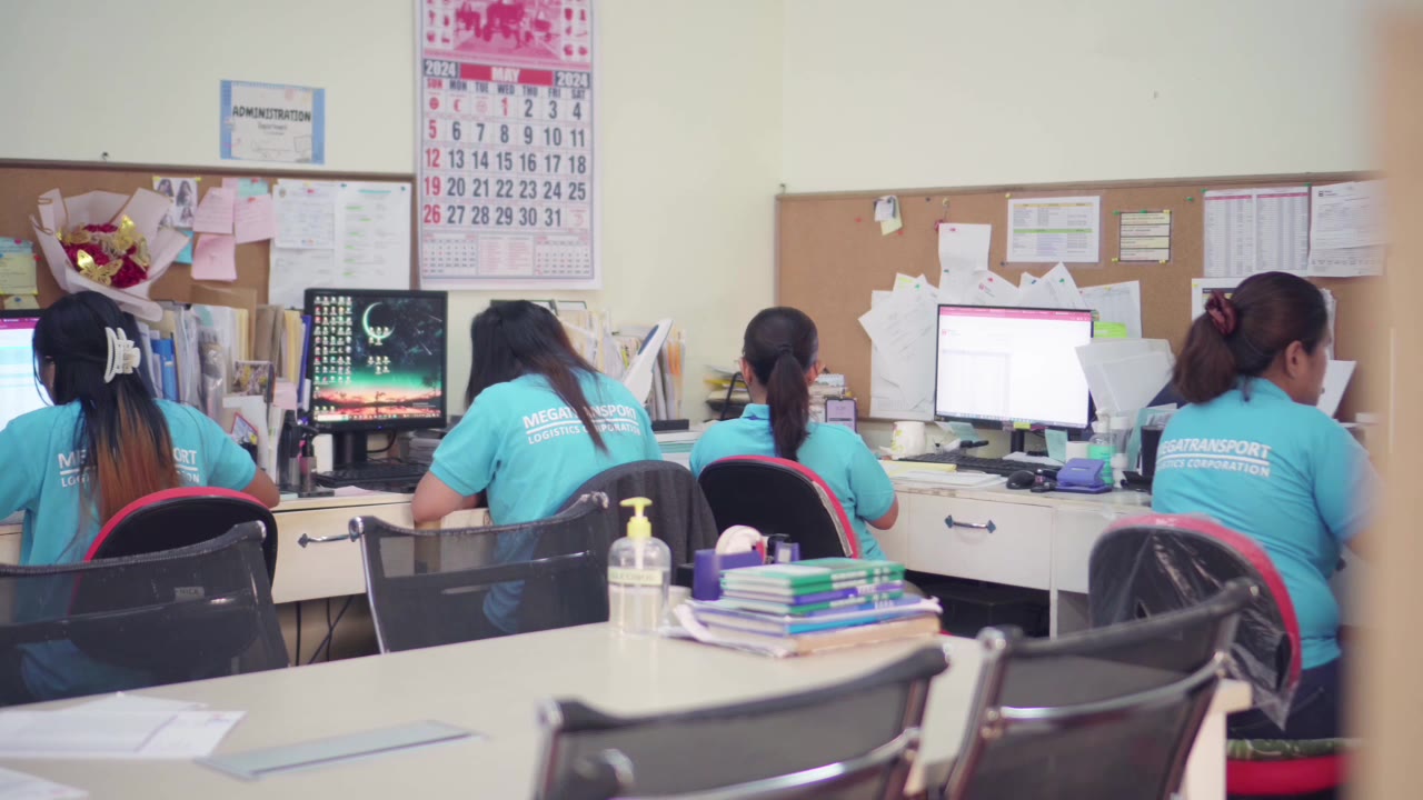 Megatransport office staff at their workstations